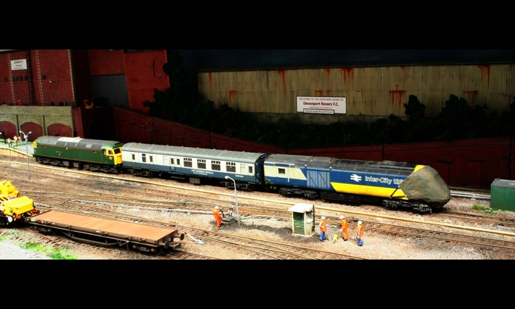 Damaged HST power car off to works for repair.